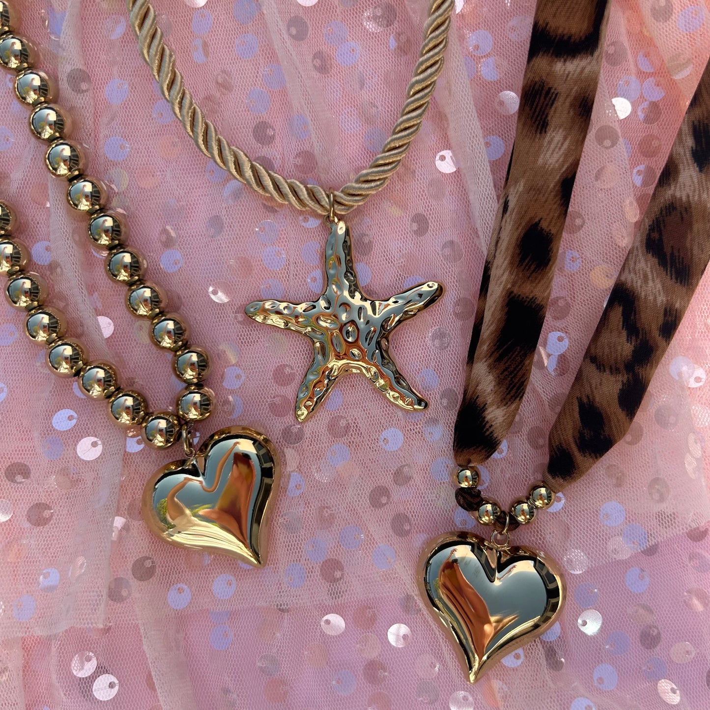 Leopard heart ketting